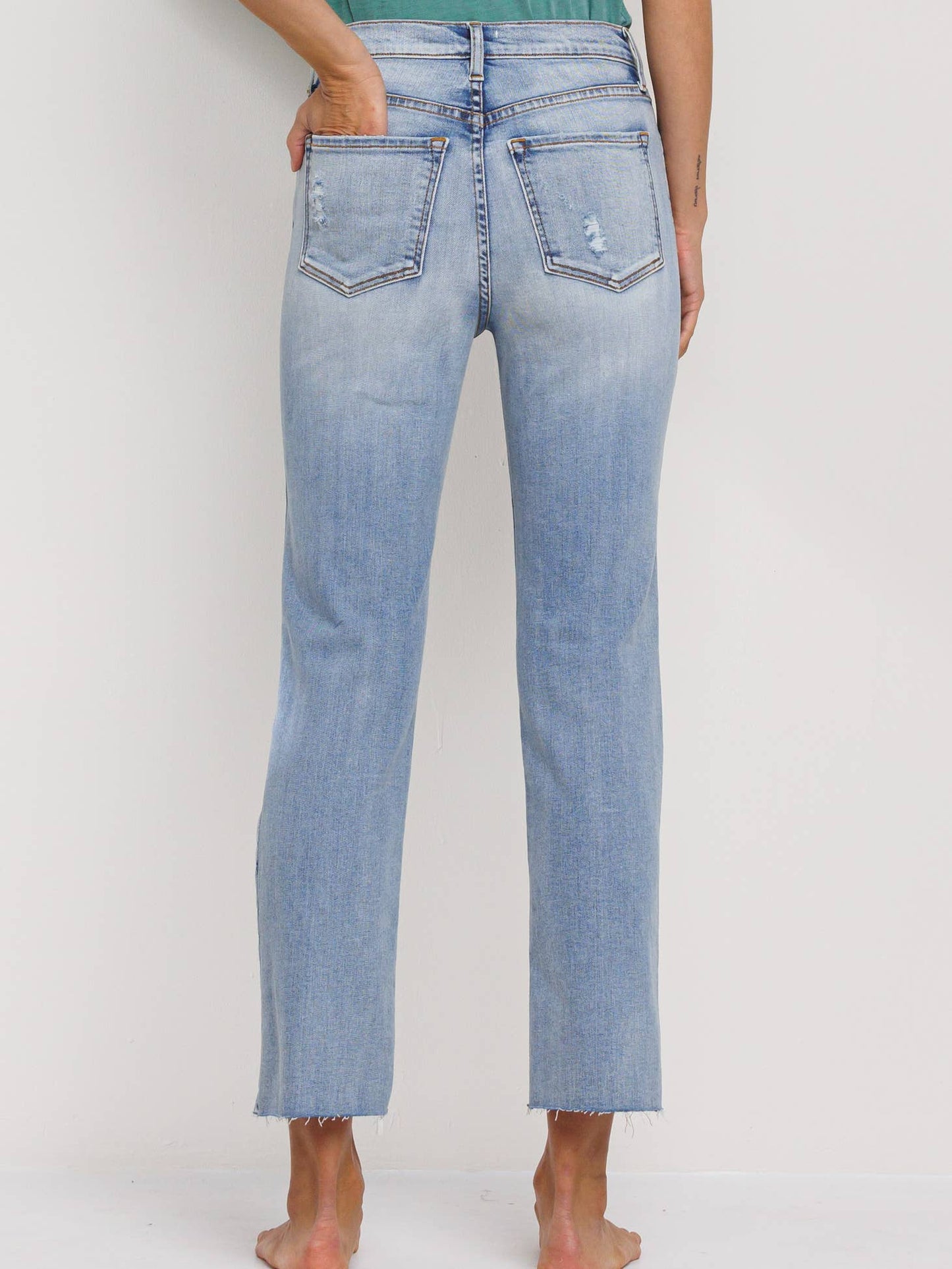 High Rise Straight Jeans with Stretch and Rips